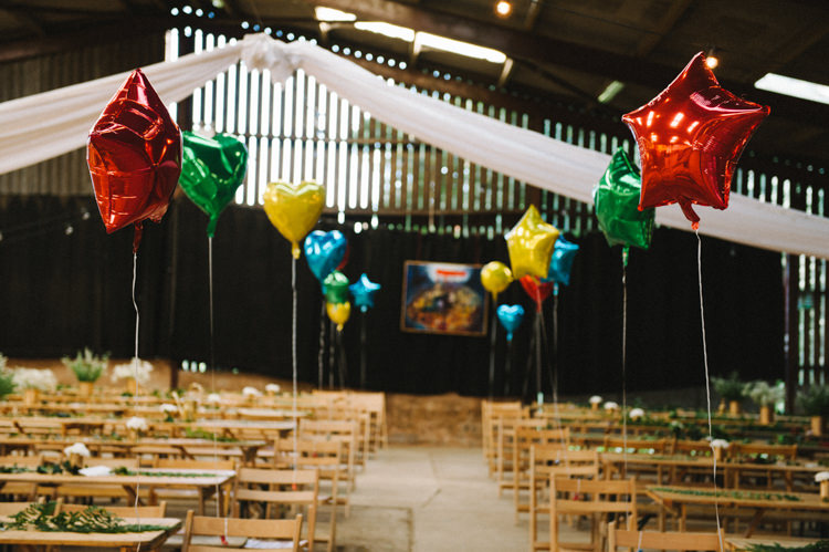 Balloons Aisle Stars Hearts Artistic Creative Colourful Farm Wedding http://www.mustardyellowphotography.com/