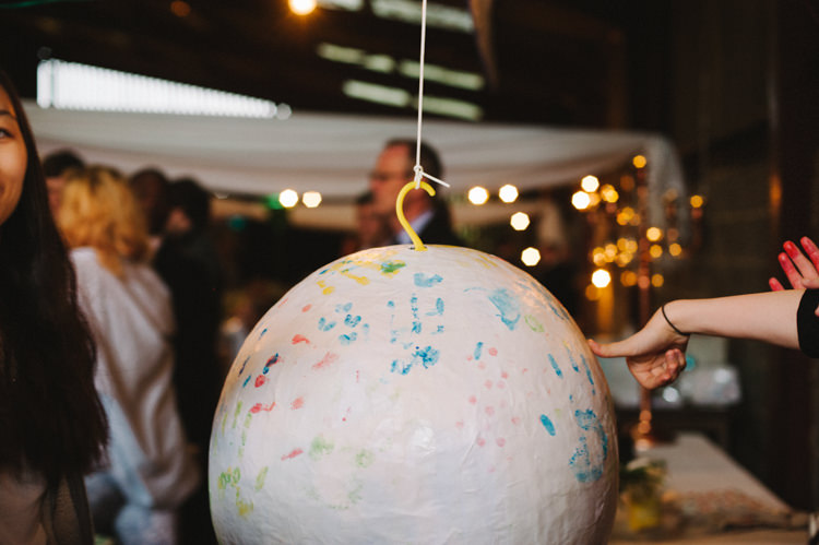 Hand Print Guest Book Ball Artistic Creative Colourful Farm Wedding http://www.mustardyellowphotography.com/