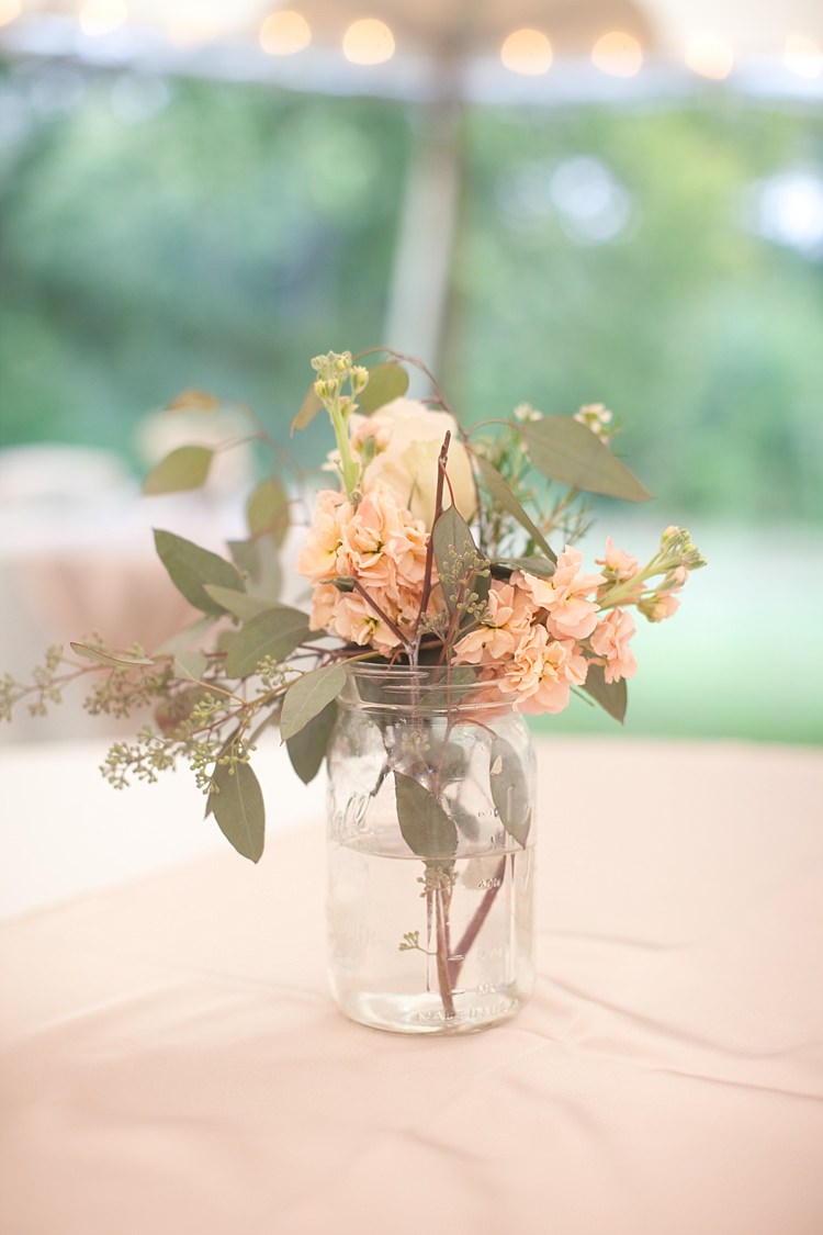 Reception Glass Jar Fresh Cream Peach Florals Tables Fairy Lights Gold & Peach Riverside Garden Wedding http://kellyhornberger.com/ 