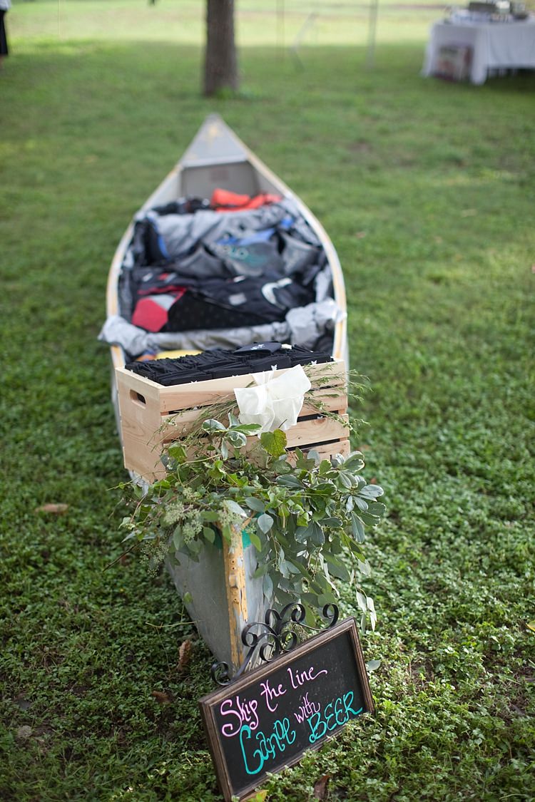 Wooden Canoe Greenery Blackboard Sign Handwritten Coloured Chalk Gold & Peach Riverside Garden Wedding http://kellyhornberger.com/ 