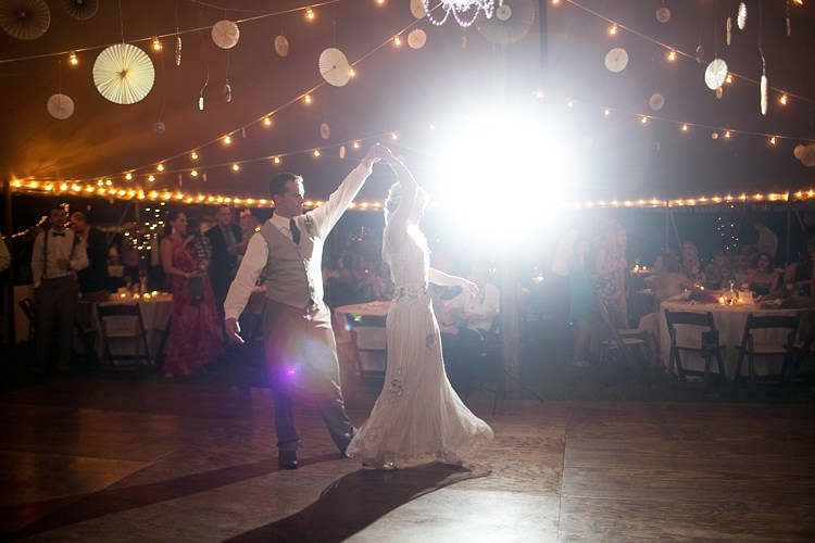 Bride Beaded Jenny Packham Bridal Gown Groom Khaki Pants Vest Brown Tie Dance Floor Hanging Décor Lanterns Fairy Lights Guests Gold & Peach Riverside Garden Wedding http://kellyhornberger.com/ 