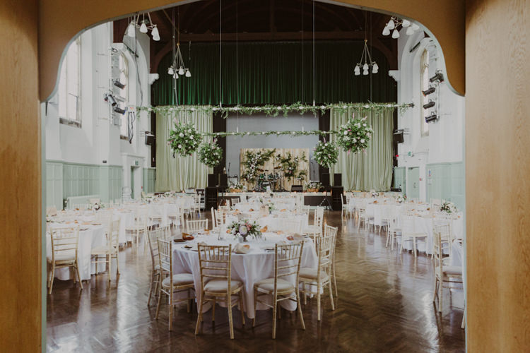 Flower Bombs Pallet Backdrop Hall Brighton College Romantic Stylish Relaxed Sea Wedding http://www.oxiphotography.co.uk/