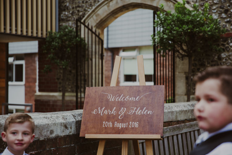 Wooden Welcome Sign Calligraphy Romantic Stylish Relaxed Sea Wedding http://www.oxiphotography.co.uk/