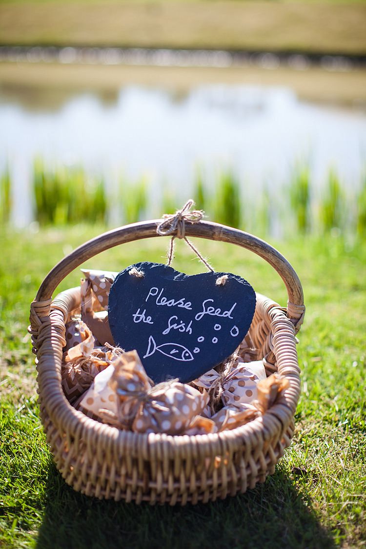Fish Food Pond Pretty Outdoorsy Yellow Tipi Wedding http://www.binkynixon.com/