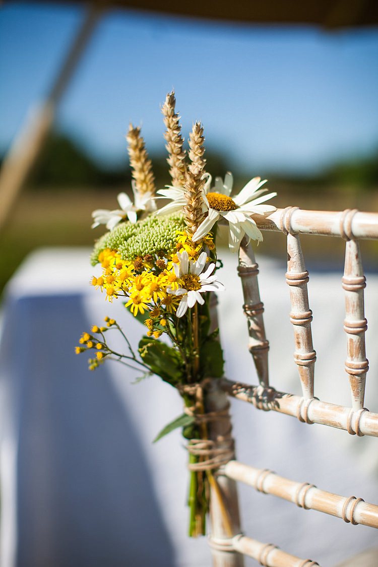 Daisy Wheat Chair Aisle Pew End Flowers Pretty Outdoorsy Yellow Tipi Wedding http://www.binkynixon.com/