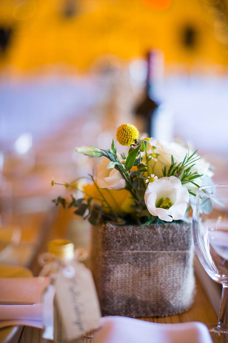 Hessian Burlap Flowers Centrepiece Decor Tables Pretty Outdoorsy Yellow Tipi Wedding http://www.binkynixon.com/