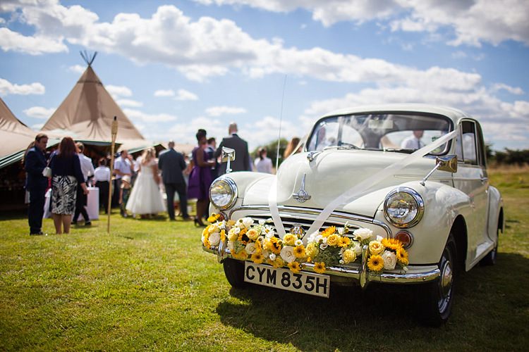 Moris Minor Car Flowers Pretty Outdoorsy Yellow Tipi Wedding http://www.binkynixon.com/