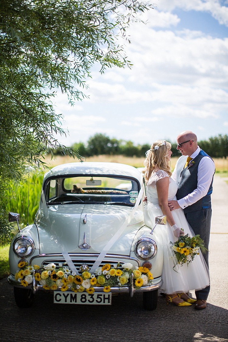 Morris Minor Car Flowers Pretty Outdoorsy Yellow Tipi Wedding http://www.binkynixon.com/