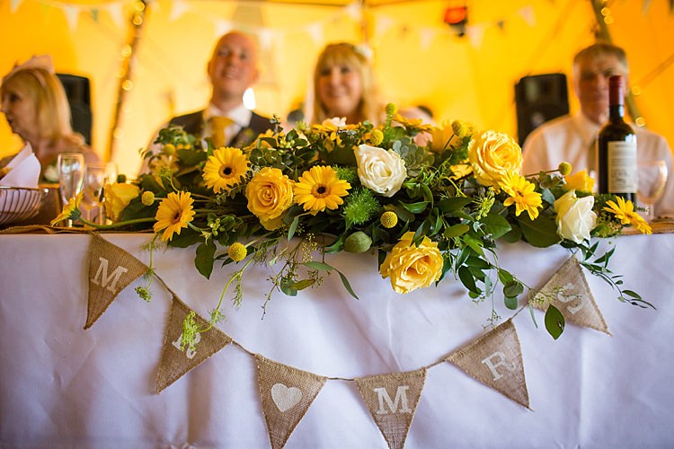 Top Table Flowers Bunting Pretty Outdoorsy Yellow Tipi Wedding http://www.binkynixon.com/