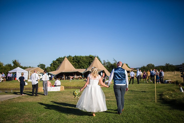 Pretty Outdoorsy Yellow Tipi Wedding http://www.binkynixon.com/