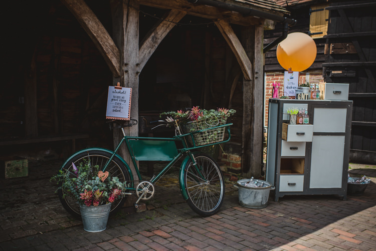 Bike Bicycle Flowers Decor Magical Fun Outdoor Barn Wedding http://www.sophieduckworthphotography.com/