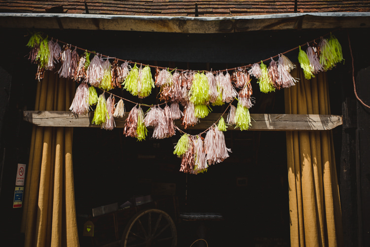 Tassel Garland Magical Fun Outdoor Barn Wedding http://www.sophieduckworthphotography.com/