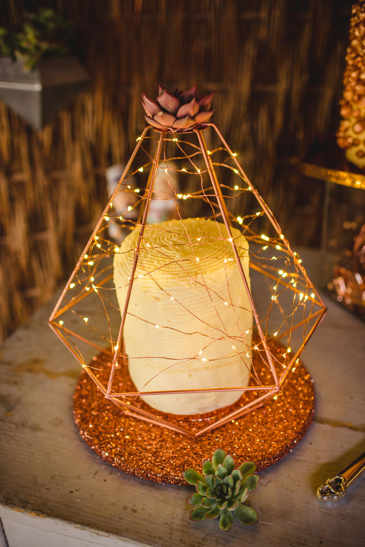 Copper Rose Gold Cake Fairy Lights Magical Fun Outdoor Barn Wedding http://www.sophieduckworthphotography.com/