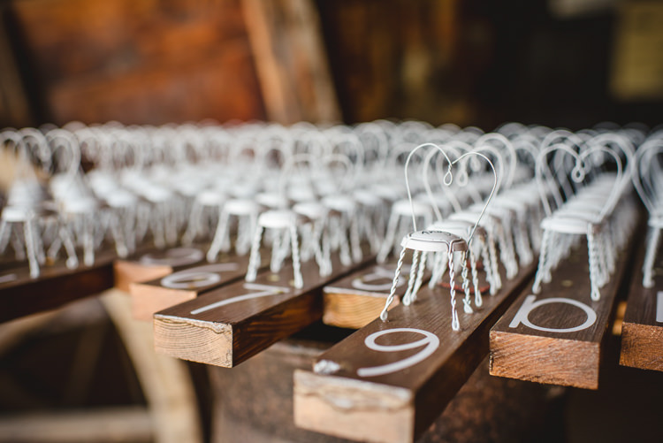 Seating Table Plan Bottle Tops Rustic Wooden Chair Magical Fun Outdoor Barn Wedding http://www.sophieduckworthphotography.com/