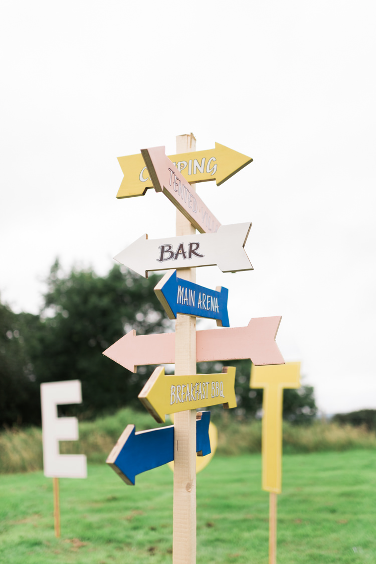 Painted Wooden Sign Post Yellow Blue Camping Festival Rave Tipi Wedding http://petalandblushartistry.co.uk/