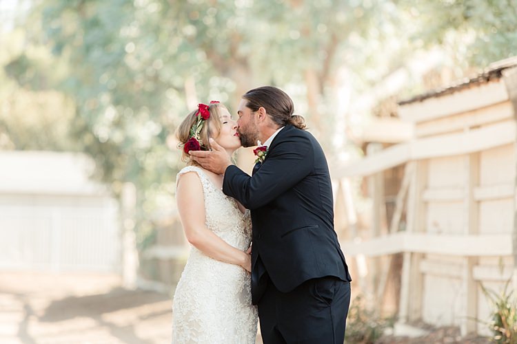 First Look Bride Lace V Neck Bridal Gown Red Maroon Rose Floral Crown Groom Black Suit White Shirt Bowtie Rose Buttonhole Luxe Outdoor Garden Wedding in California http://figlewiczphotography.com/