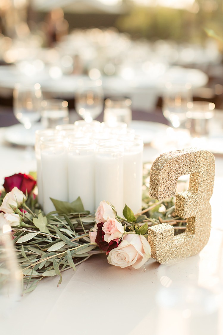 Outdoor Ceremony Fresh Floral Centrepiece Red Pink Cream Roses Candles Gold Glitter Table Number Luxe Outdoor Garden Wedding in California http://figlewiczphotography.com/