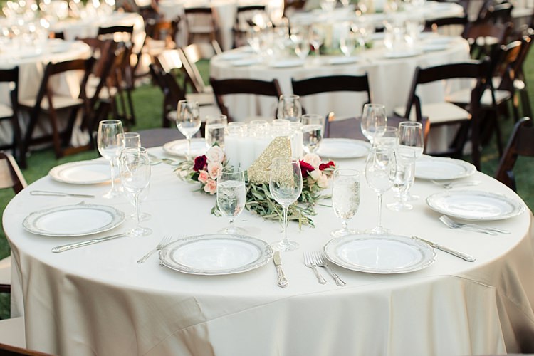 Outdoor Reception Fresh Floral Centrepiece Pink Red Cream Roses Candles Gold Glitter Table Number Luxe Outdoor Garden Wedding in California http://figlewiczphotography.com/