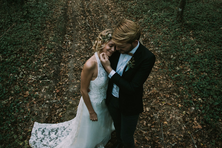 Bride Lace Halter-Neck Bridal Gown Long Train Floral Crown Groom Black Jacket White Polka Dot Shirt Wooden Bowtie Floral Buttonhole Autumn Leaves Organic Woodland Elopement Wedding Ideas http://www.miraalpajarito.es/