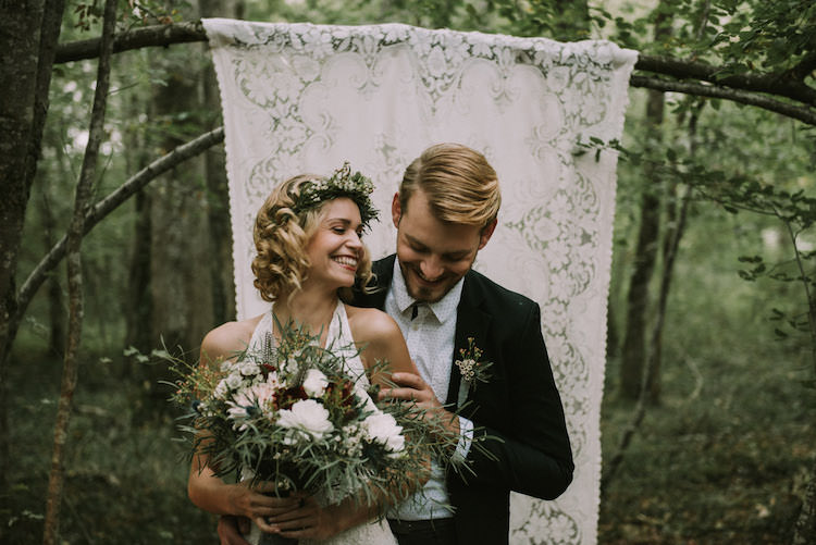 Bride Lace Halter-Neck Bridal Gown Floral Crown White Maroon Blush Bouquet Groom Black Jacket White Polka Dot Shirt Hanging Lace Décor Organic Woodland Elopement Wedding Ideas http://www.miraalpajarito.es/
