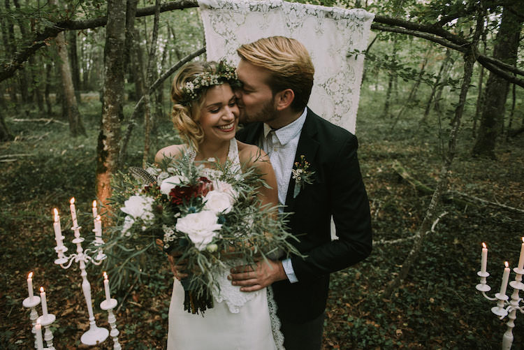 Bride Lace Halter-Neck Bridal Gown Floral Crown White Maroon Blush Bouquet Groom Black Jacket White Polka Dot Shirt Hanging Lace Décor Candlesticks Organic Woodland Elopement Wedding Ideas http://www.miraalpajarito.es/