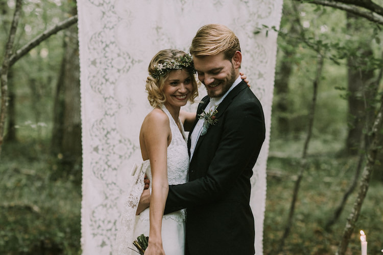 Bride Lace Halter-Neck Bridal Gown Floral Crown White Maroon Blush Bouquet Groom Black Jacket White Polka Dot Shirt Hanging Lace Décor Organic Woodland Elopement Wedding Ideas http://www.miraalpajarito.es/