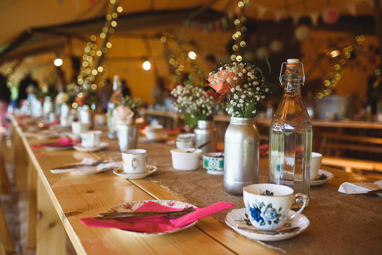 Jar Flowers Silver Long Tables Colourful Outdoorsy Festival Tipi Wedding http://www.jacksonandcophotography.com/