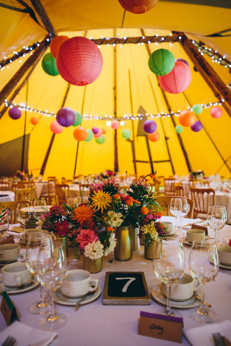 Flowers Gold Jars Bottles Centrepiece Table Decor Lanterns Fairy Lights Colourful Outdoorsy Tipi Wedding http://amybphotography.co.uk/