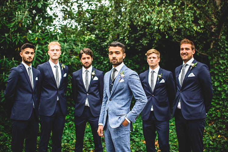 Blue Suit Groom Cardigan Grey Tie Eclectic Foliage Edison Lights Wedding http://www.tobiahtayo.com/