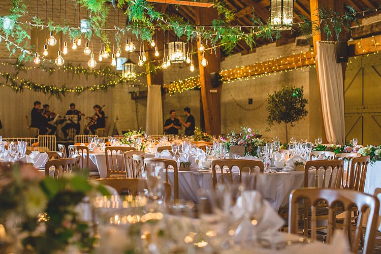 Eclectic Foliage Edison Lights Wedding http://www.tobiahtayo.com/
