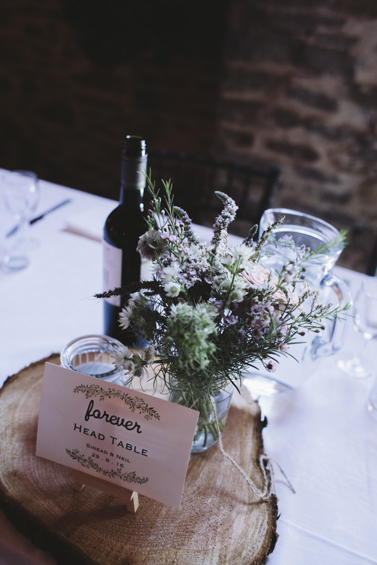 Centrepiece Log Flowers Jar Decor Rustic Quintessentially English Countryside Wedding http://www.sarahmorris-photography.com/