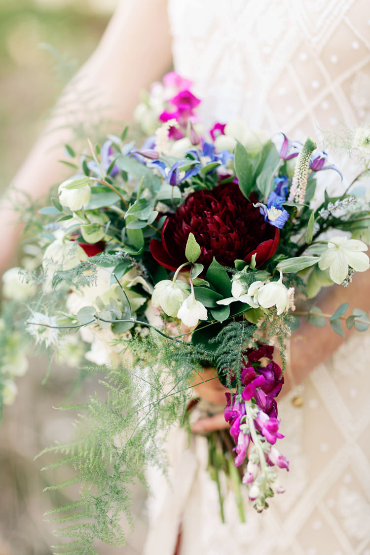 Bouquet Flowers Ribbons Feathers Red White Greenery Bride Bridal Dreamy Woodlanders Folk Wedding Ideas http://www.jobradbury.co.uk/