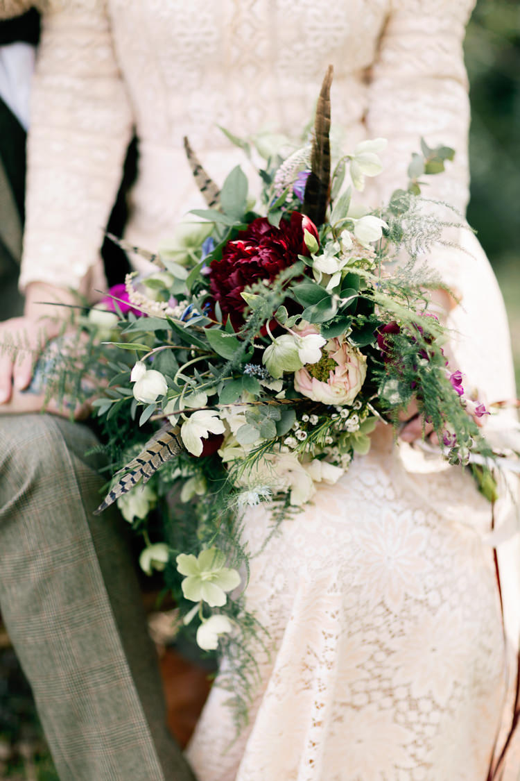 Bouquet Flowers Ribbons Feathers Red White Greenery Bride Bridal Dreamy Woodlanders Folk Wedding Ideas http://www.jobradbury.co.uk/