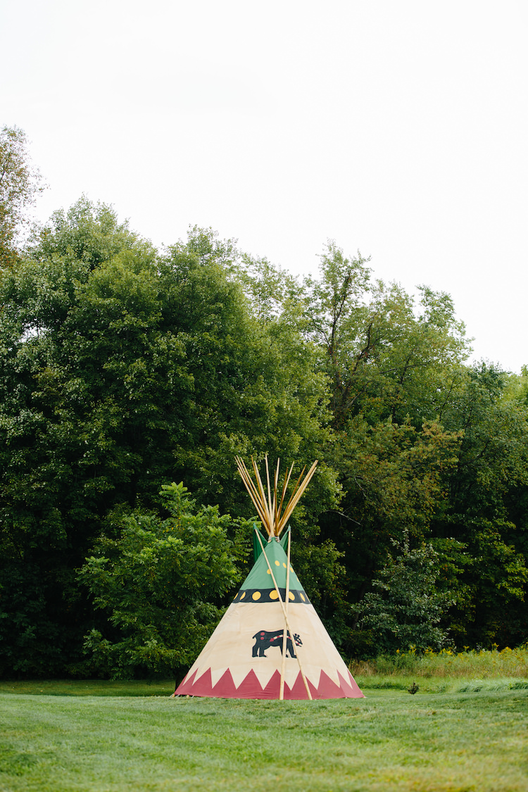 Outdoor Ceremony Location Native American Tipi Trees Grass Art Nouveau Autumn Burgundy Wedding http://www.jbonadiophoto.com/