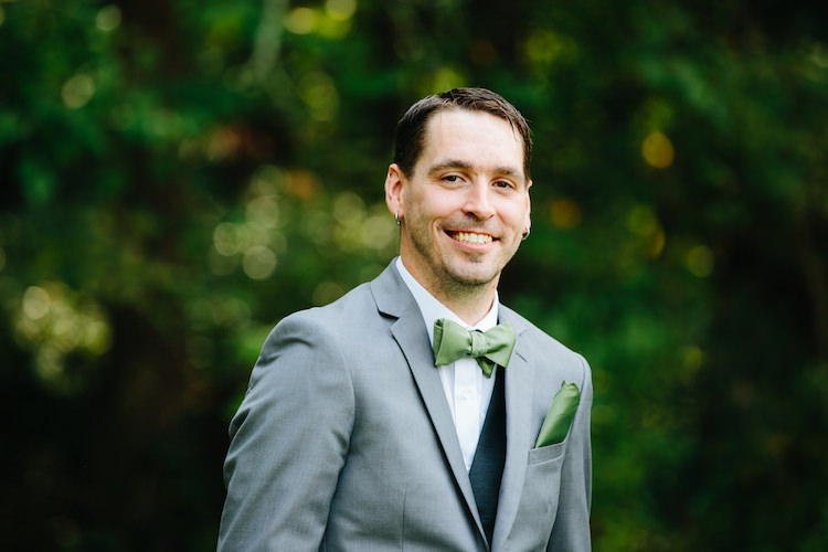 Groom Grey Suit Black Vest Green Bowtie Pocket Square Earrings Art Nouveau Autumn Burgundy Wedding http://www.jbonadiophoto.com/