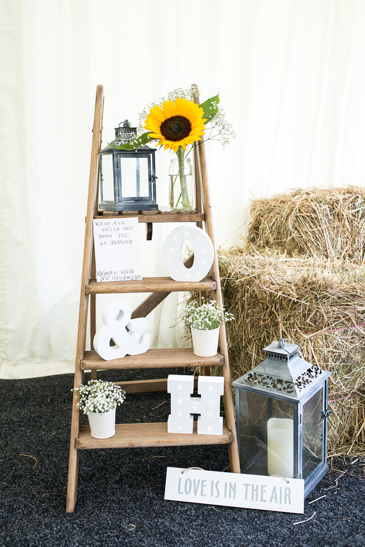 Wooden Ladder Decor Summer Sunflowers Marquee Wedding http://maddiewaters.co.uk/
