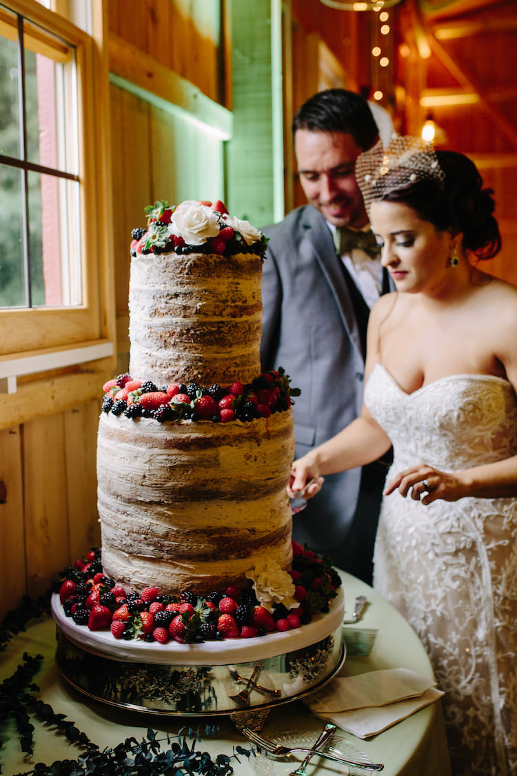 Naked Wedding Cake Fresh Berries White Florals Bride Strapless Lace Watters Bridal Gown Birdcage Veil Art Deco Earrings Groom Grey Suit Green Bowtie Cake Cutting Art Nouveau Autumn Burgundy Wedding http://www.jbonadiophoto.com/
