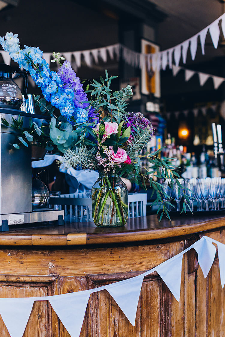 Jar Flowers Decor Decoration Minimalist City 1970s East London Pub Wedding http://www.curiousrosephotography.com/
