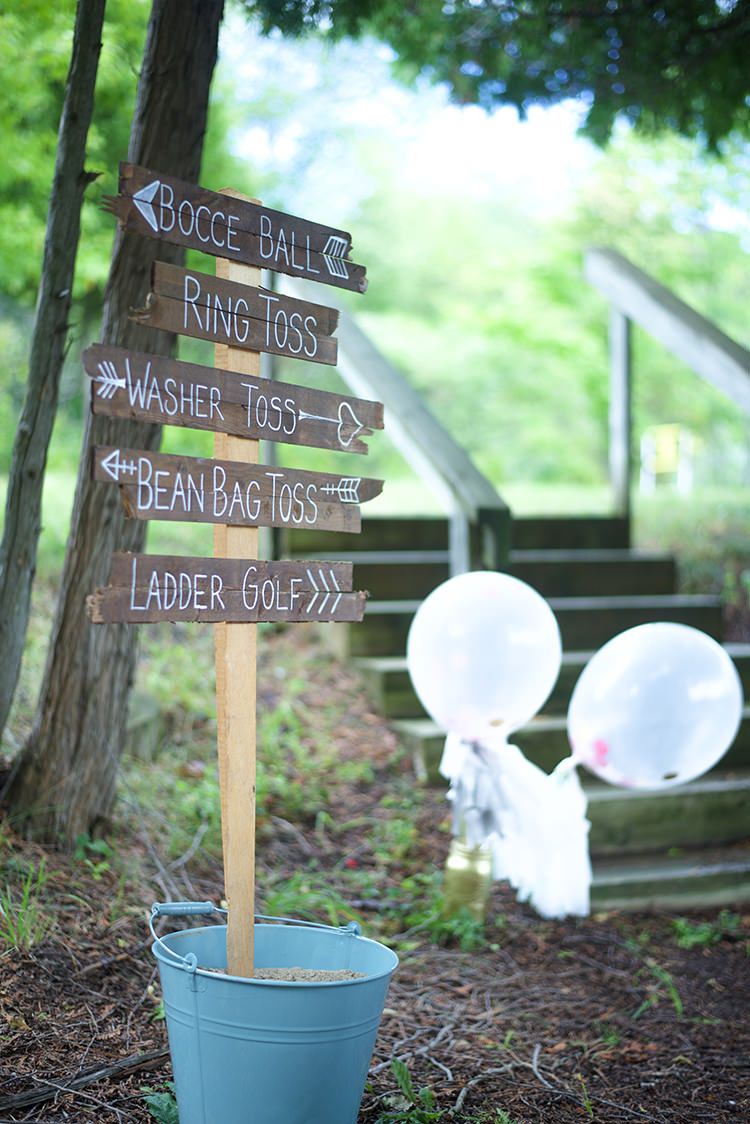 Outdoor Ceremony Handwritten Wooden Sign Directions Outdoor Games Blue Tin Bucket Large Balloons Woodland Waterfall Mint Wedding Ontario http://www.laurenmccormickphotography.com/