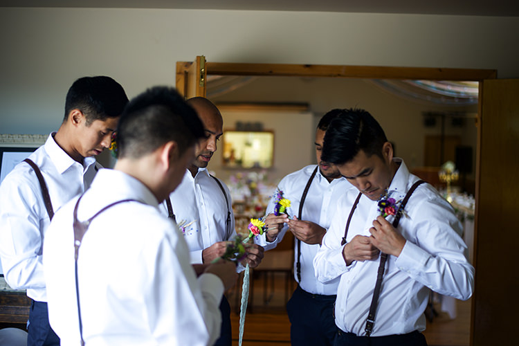 Groom Groomsmen White Shirts Brown Leather Suspenders Navy Pants Multicoloured Floral Buttonholes Woodland Waterfall Mint Wedding Ontario http://www.laurenmccormickphotography.com/