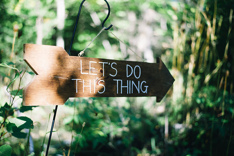 Outdoor Ceremony Painted Wooden Arrow Sign Woodland Waterfall Mint Wedding Ontario http://www.laurenmccormickphotography.com/