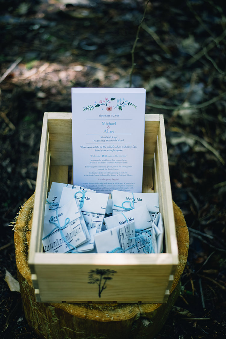 Outdoor Ceremony Wedding Stationery Invitation Sheet Music Ribbons Wooden Crate Woodland Waterfall Mint Wedding Ontario http://www.laurenmccormickphotography.com/