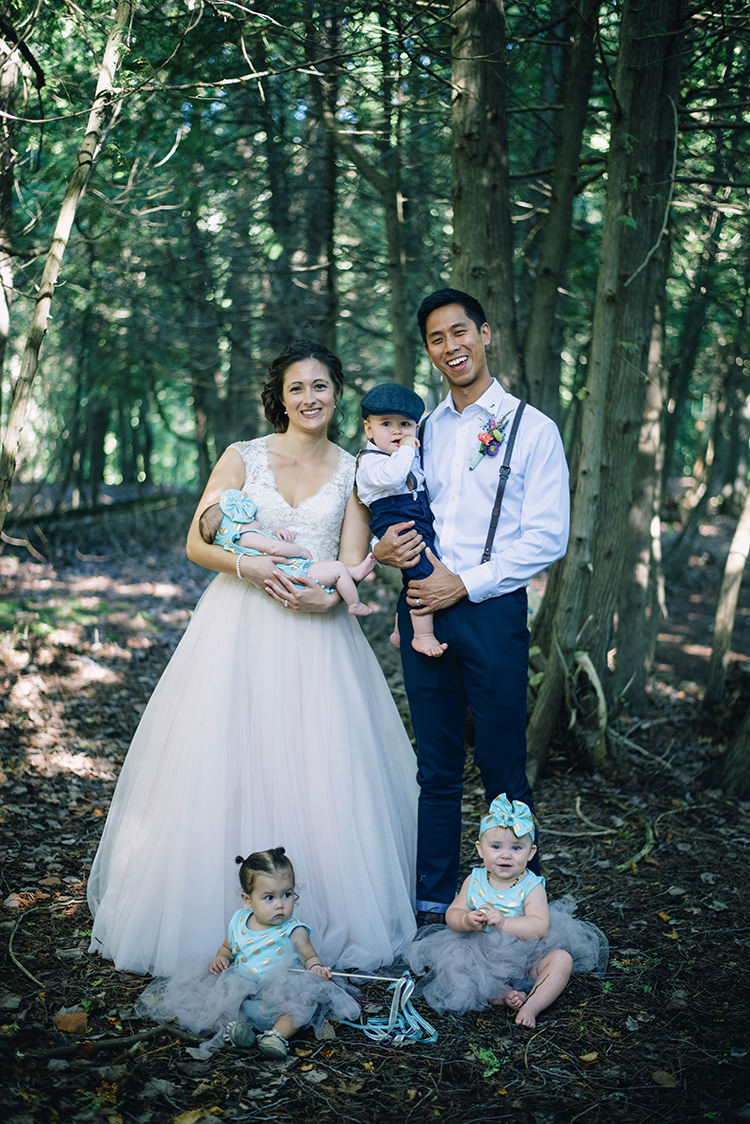 Bride Allure Champagne Lace Tulle Bridal Gown Groom White Shirt Brown Leather Suspenders Navy Pants Multicoloured Floral Buttonhole Flower Girls Mint Gold Headbands Page Boy Navy Pants Suspenders Woodland Waterfall Mint Wedding Ontario http://www.laurenmccormickphotography.com/