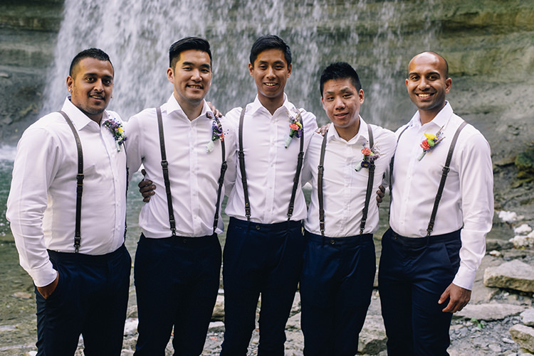 Groom Groomsmen White Shirts Brown Leather Suspenders Navy Pants Multicoloured Floral Buttonholes Woodland Waterfall Mint Wedding Ontario http://www.laurenmccormickphotography.com/