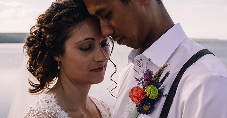 Bride Allure Champagne Lace Tulle Bridal Gown Pearl Earrings Groom White Shirt Brown Leather Suspenders Navy Pants Multicoloured Floral Buttonhole Woodland Waterfall Mint Wedding Ontario http://www.laurenmccormickphotography.com/