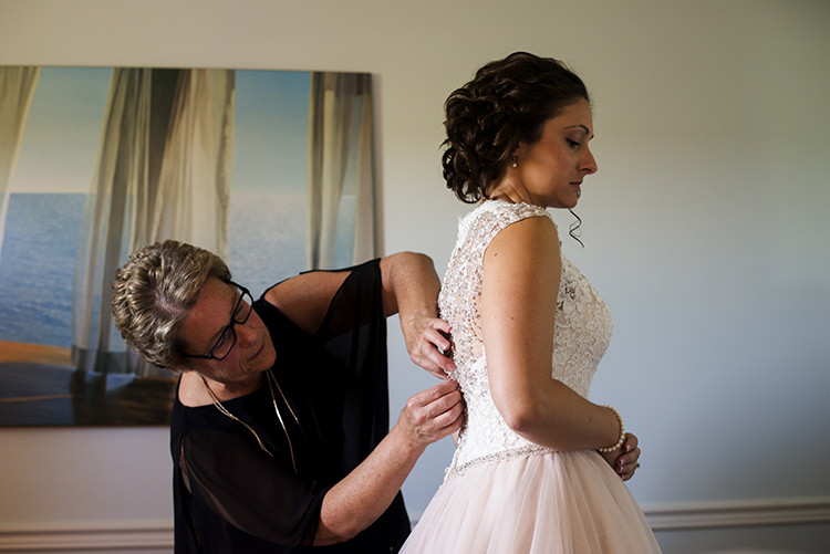 Bride Allure Champagne Lace Tulle Bridal Gown Pearl Earrings Soft Curls Hairstyle Getting Ready Woodland Waterfall Mint Wedding Ontario http://www.laurenmccormickphotography.com/