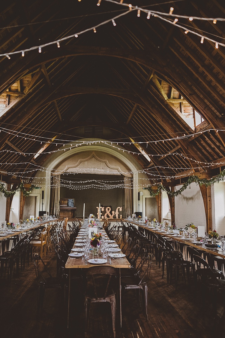 FAiry Lights Rustic Industrial Table Chairs Decor Eclectic Whimsical Village Hall Wedding http://www.nicolacasey.photography/