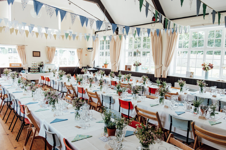 Bunting Blue White Long Table Industrial Wooden Chairs Rural Handfasting Village Hall Wedding http://www.annapumerphotography.com/