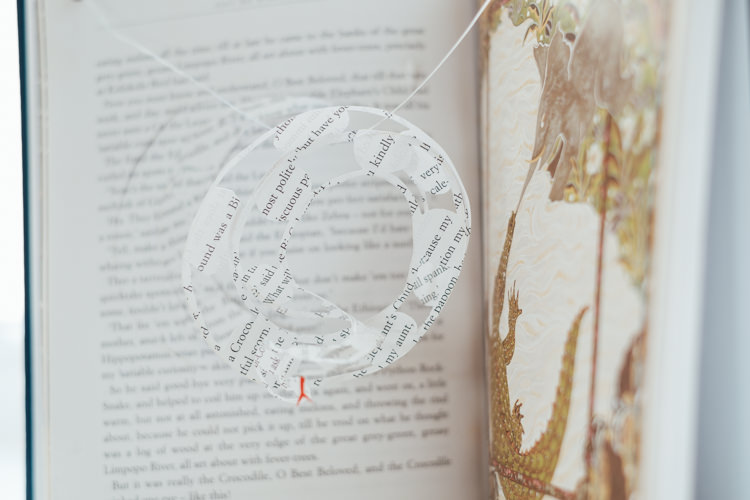Paper Cut Books Art Display Decor Rural Handfasting Village Hall Wedding http://www.annapumerphotography.com/