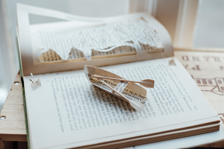 Paper Cut Books Art Display Decor Rural Handfasting Village Hall Wedding http://www.annapumerphotography.com/